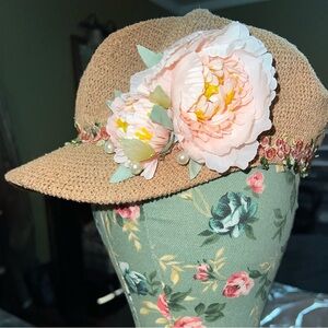 Woven Woman’s Newsie Cap with Pink Floral Embellishments